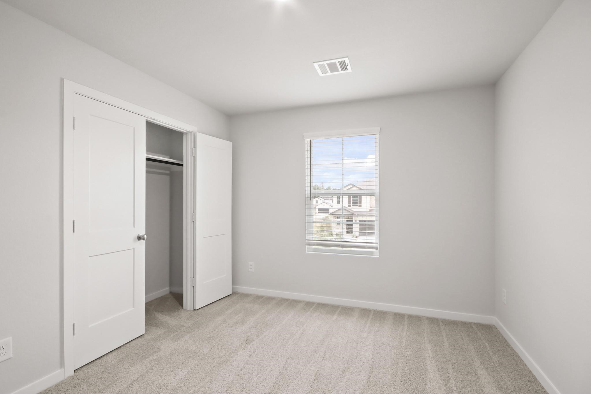 227 Brazen Forest Trail Magnolia, TX 77354 - Photo 11 of 22 an empty room with windows
