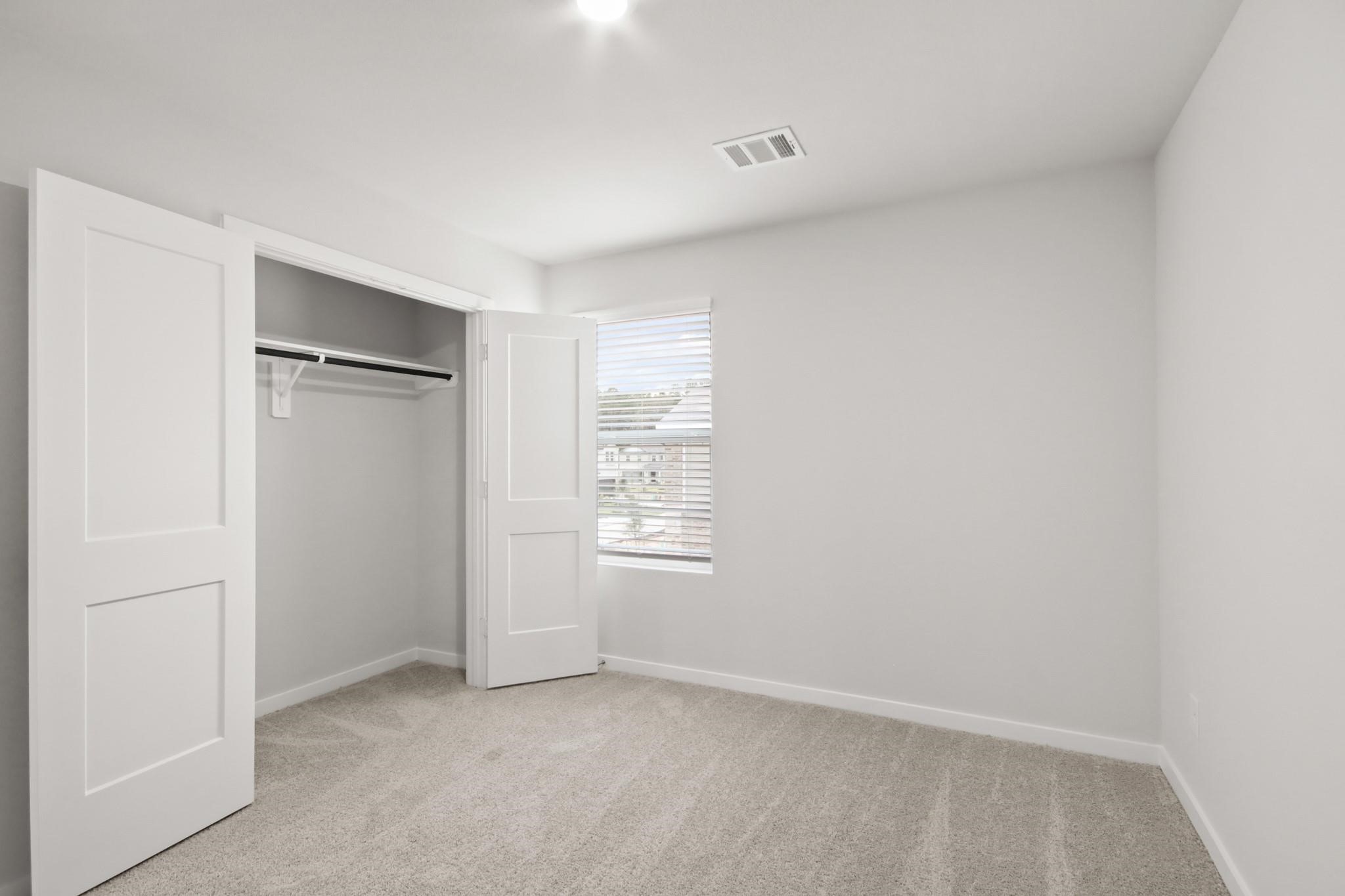 227 Brazen Forest Trail Magnolia, TX 77354 - Photo 14 of 22 a view of an empty room and a window