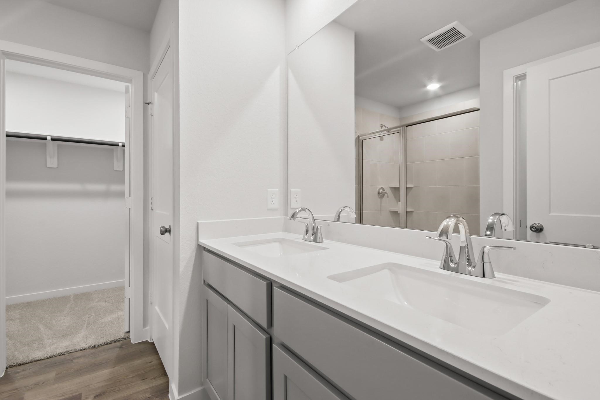 227 Brazen Forest Trail Magnolia, TX 77354 - Photo 10 of 22 a bathroom with a sink and a mirror