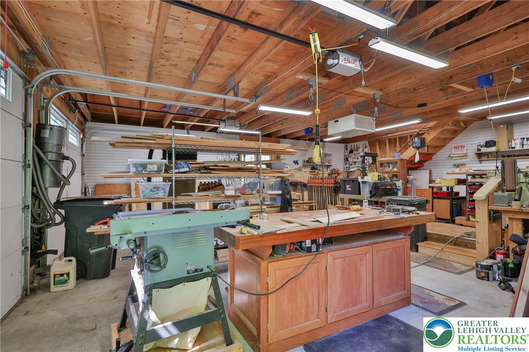 2159 Quarry Road Coopersburg, PA 18036 - Photo 54 of 79 Detached 2 bay heated garage with workshop area. Shop includes an air filtration system and vacuum. All other shop equipment is for sale but NOT included in the purchase price