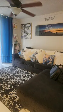 a view of a bed in a bedroom