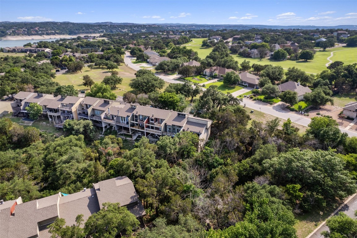 103 Comanche Drive Point Venture, TX 78645 - Photo 28 of 38 an aerial view of a house with a yard