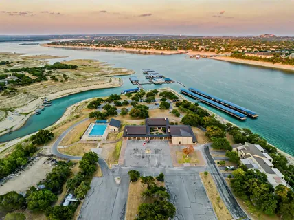an aerial view of a city and lake view