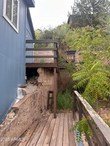 a view of balcony with furniture