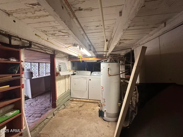 a utility room with cabinets