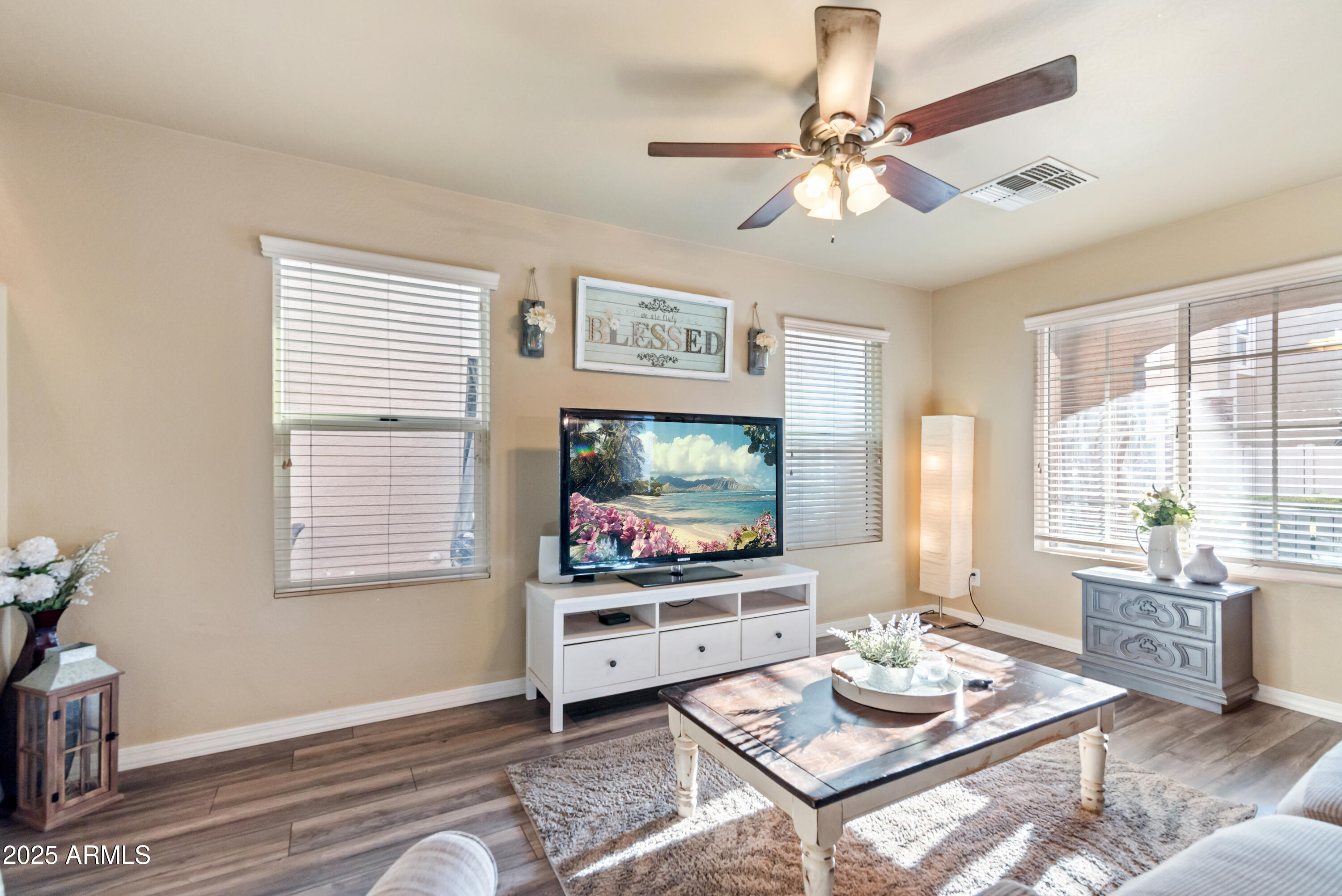 878 South Huish Drive, Unit LOT 105 Gilbert, AZ 85296 - Photo 12 of 51 a living room with furniture and a flat screen tv