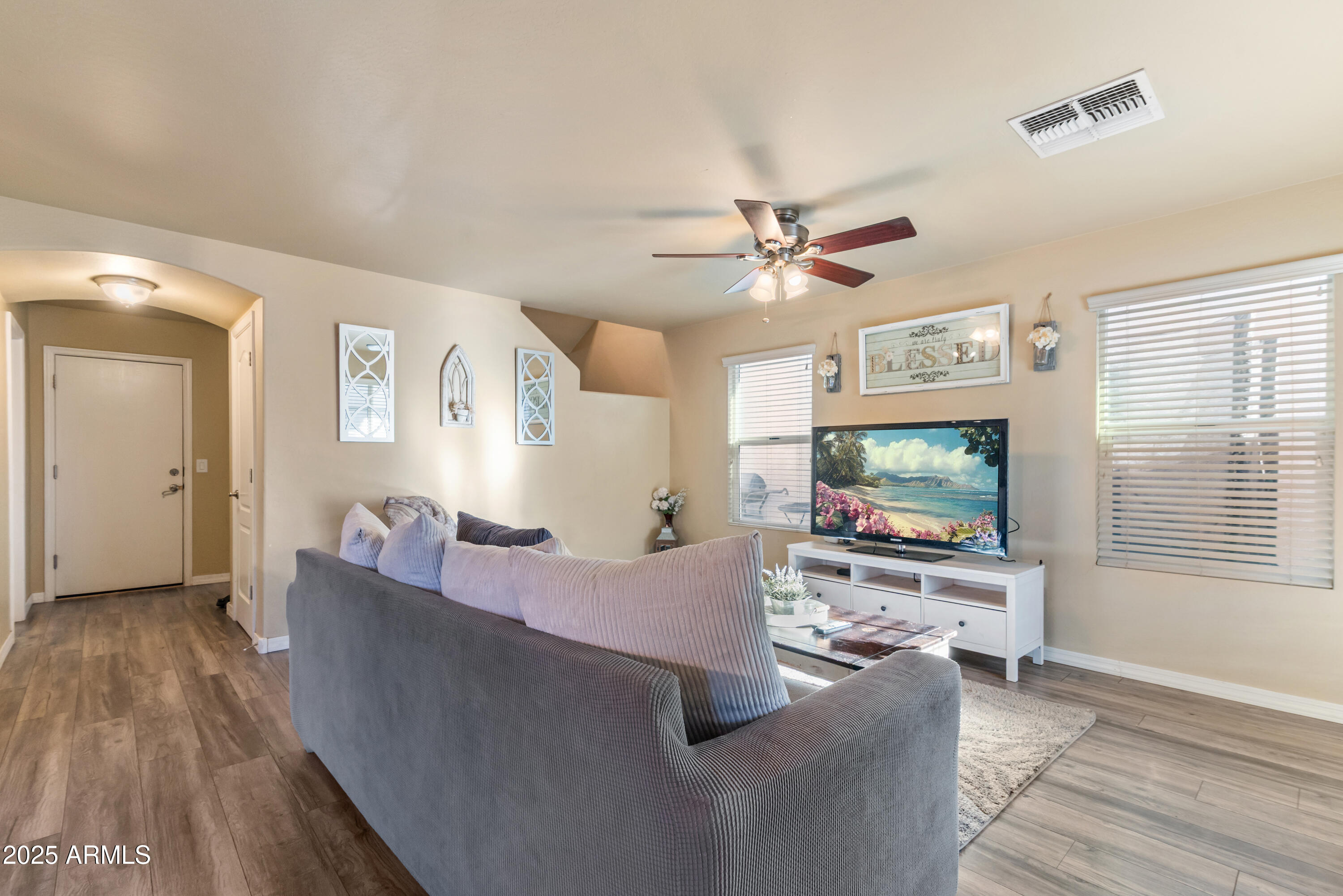 878 South Huish Drive, Unit LOT 105 Gilbert, AZ 85296 - Photo 13 of 51 a living room with furniture and a flat screen tv