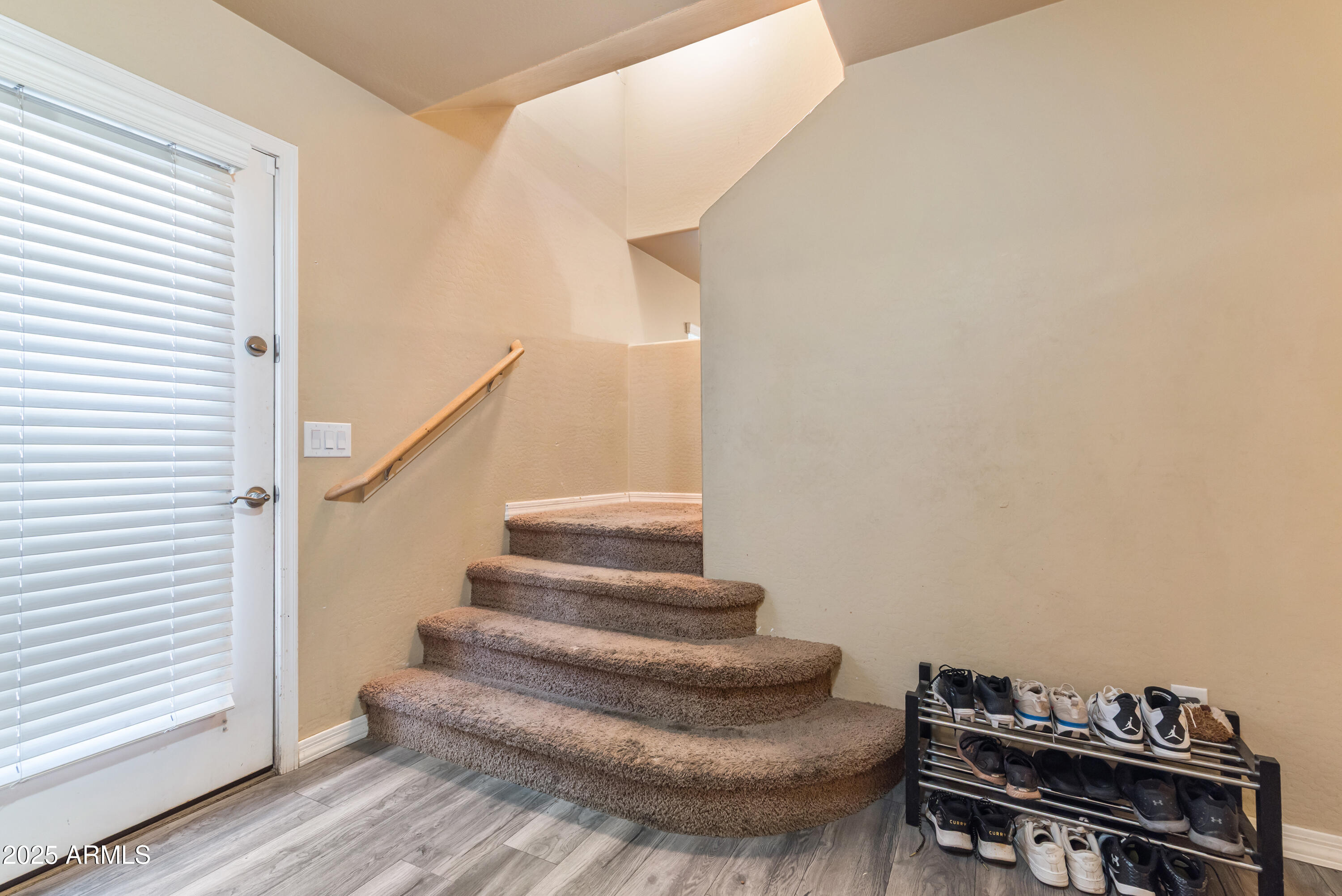 878 South Huish Drive, Unit LOT 105 Gilbert, AZ 85296 - Photo 14 of 51 a view of staircase with wooden floor