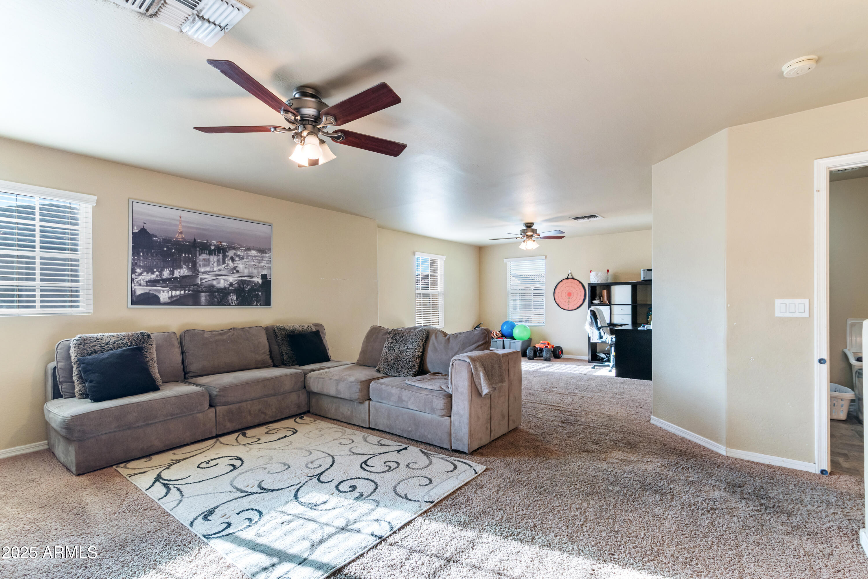 878 South Huish Drive, Unit LOT 105 Gilbert, AZ 85296 - Photo 19 of 51 a living room with furniture and a window
