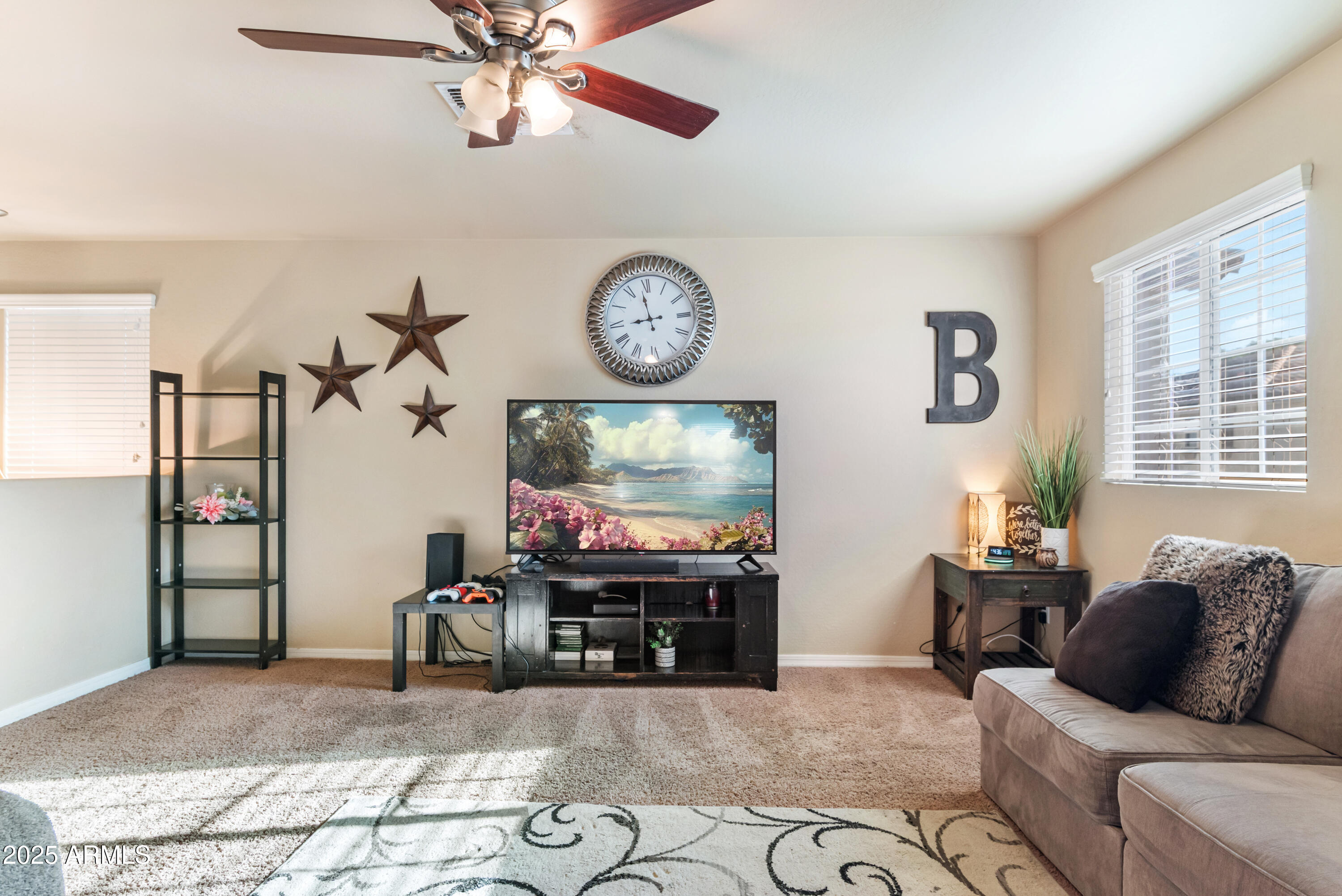 878 South Huish Drive, Unit LOT 105 Gilbert, AZ 85296 - Photo 20 of 51 a living room with furniture and a flat screen tv
