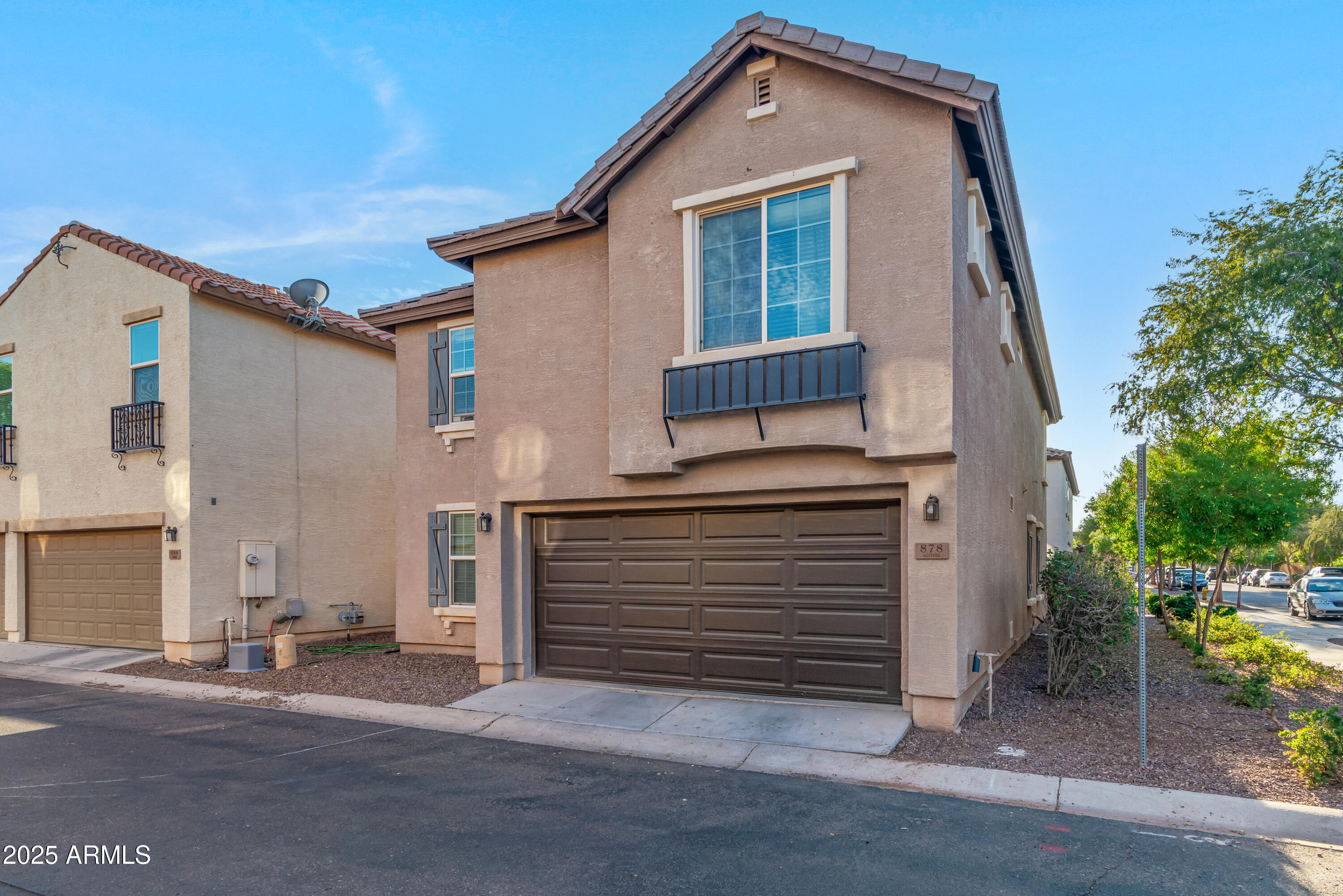 878 South Huish Drive, Unit LOT 105 Gilbert, AZ 85296 - Photo 2 of 51 a front view of a house with a yard