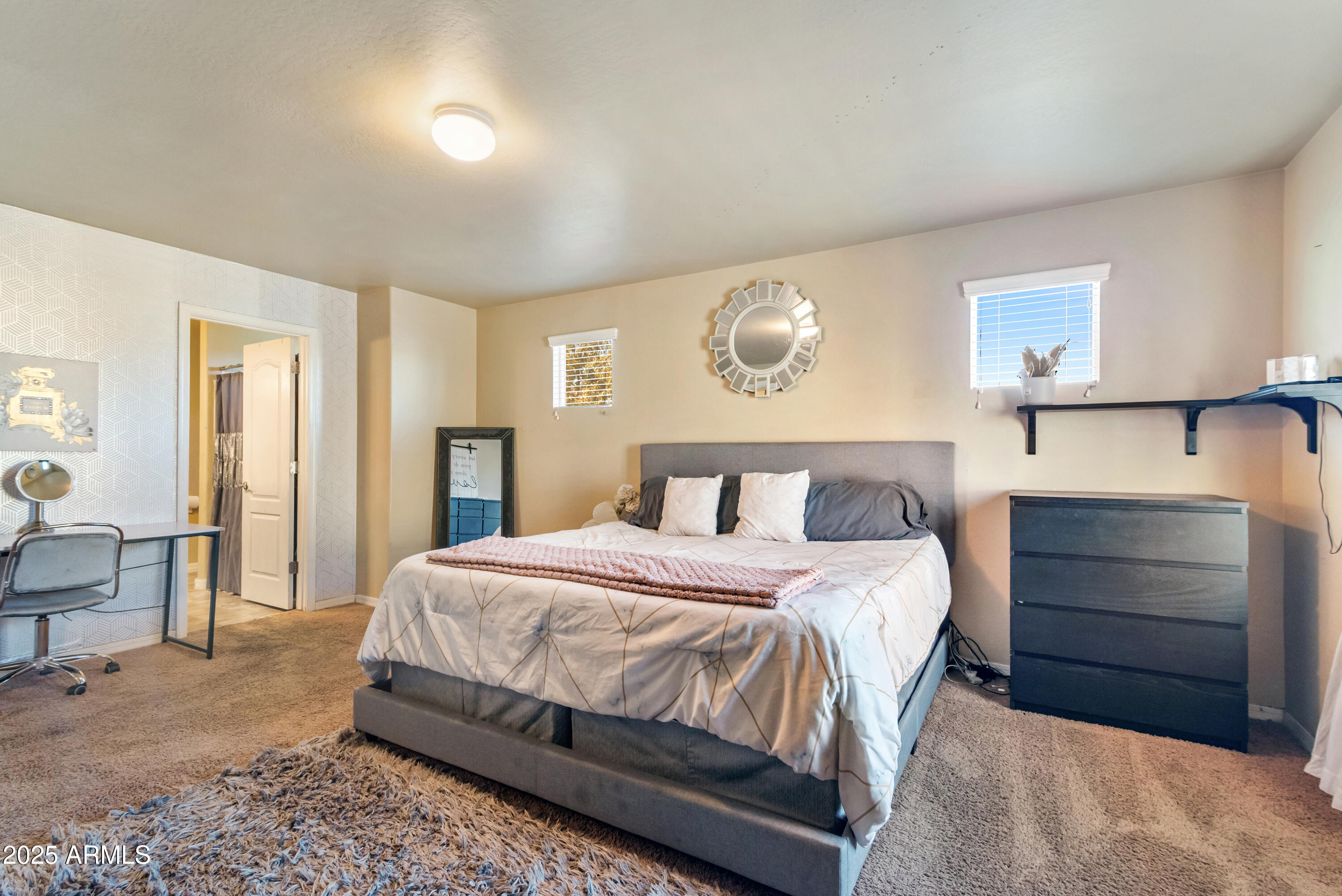 878 South Huish Drive, Unit LOT 105 Gilbert, AZ 85296 - Photo 22 of 51 a bedroom with a bed and a dresser