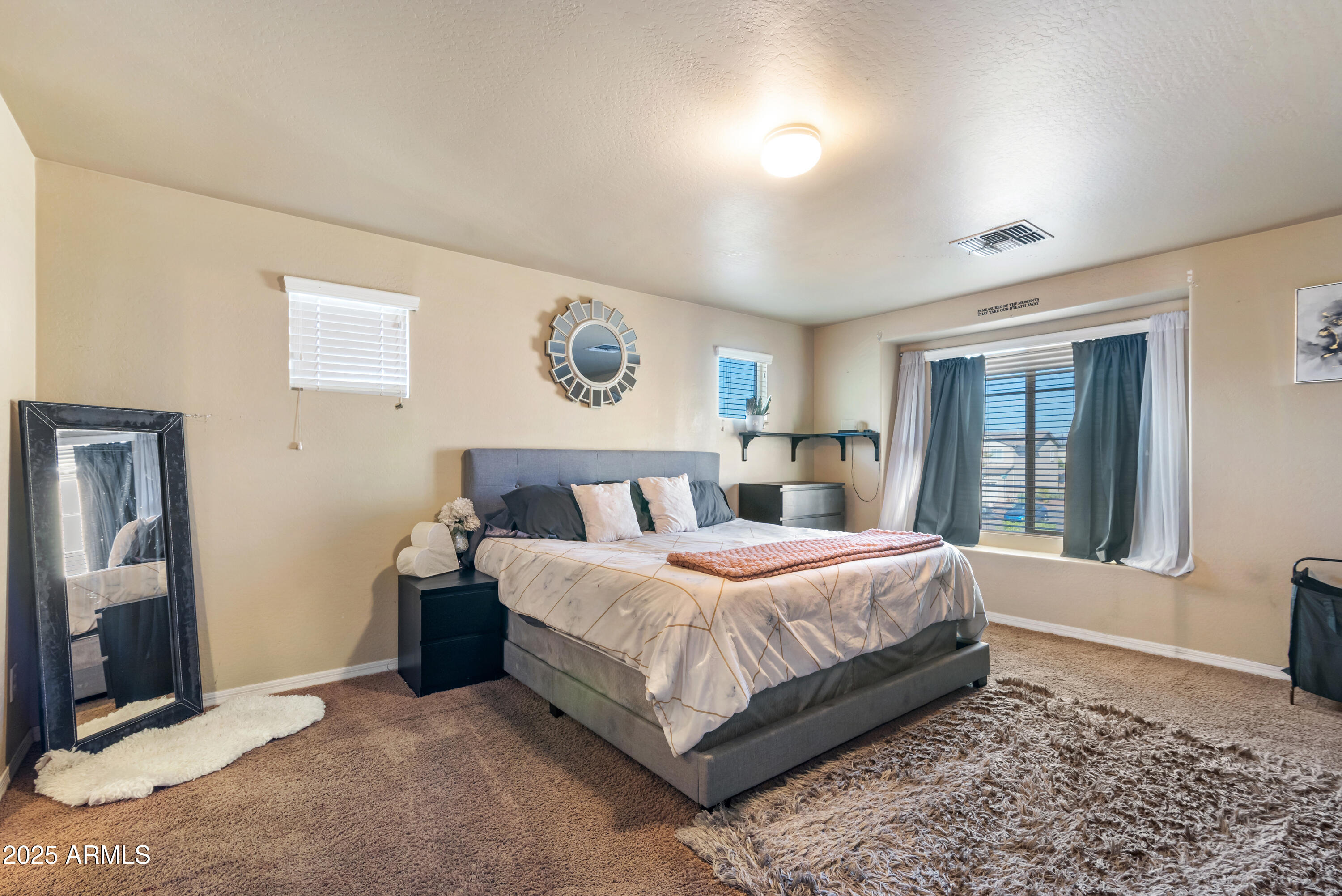 878 South Huish Drive, Unit LOT 105 Gilbert, AZ 85296 - Photo 23 of 51 a bedroom with a large bed and a window