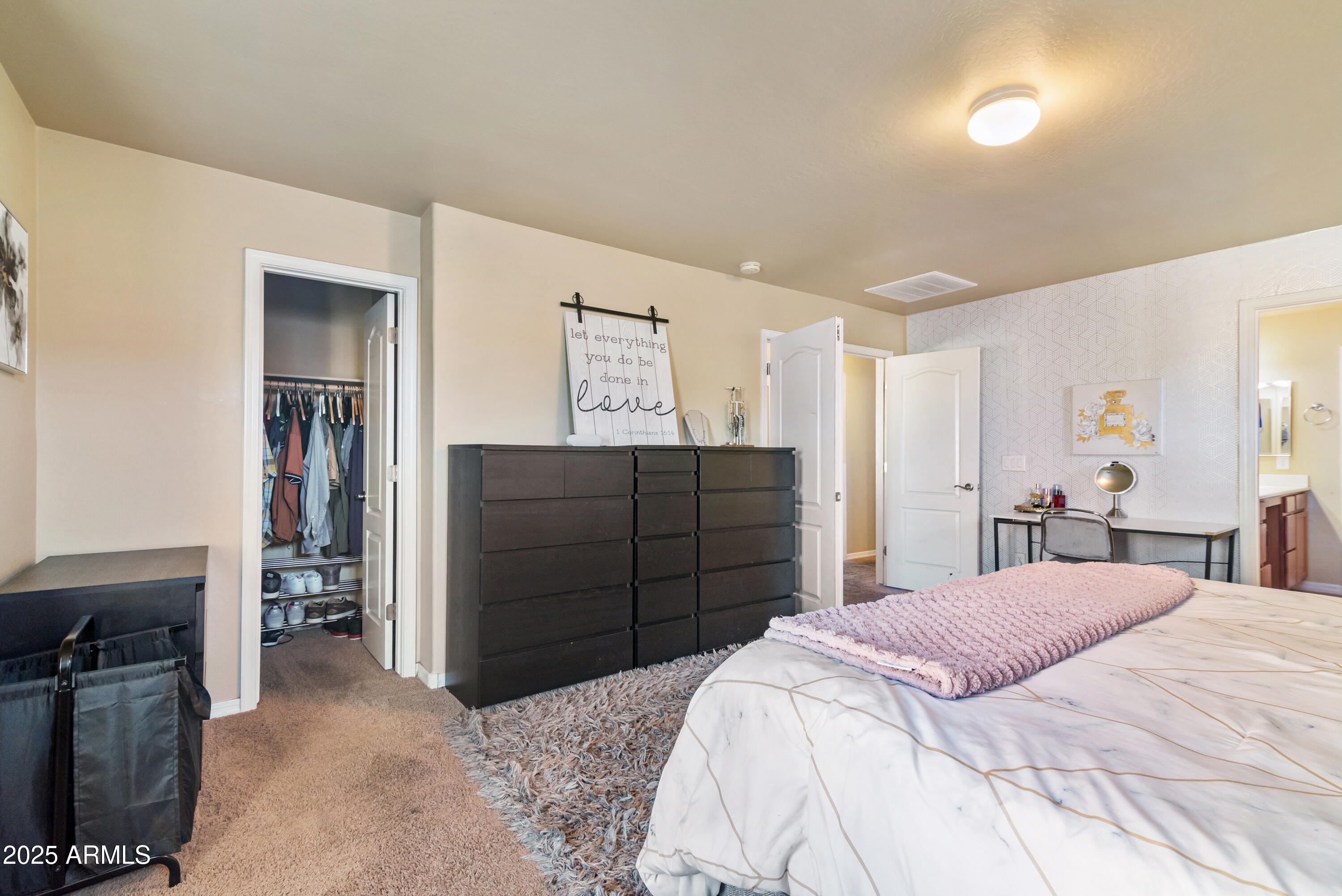 878 South Huish Drive, Unit LOT 105 Gilbert, AZ 85296 - Photo 24 of 51 a bedroom with a bed and a closet