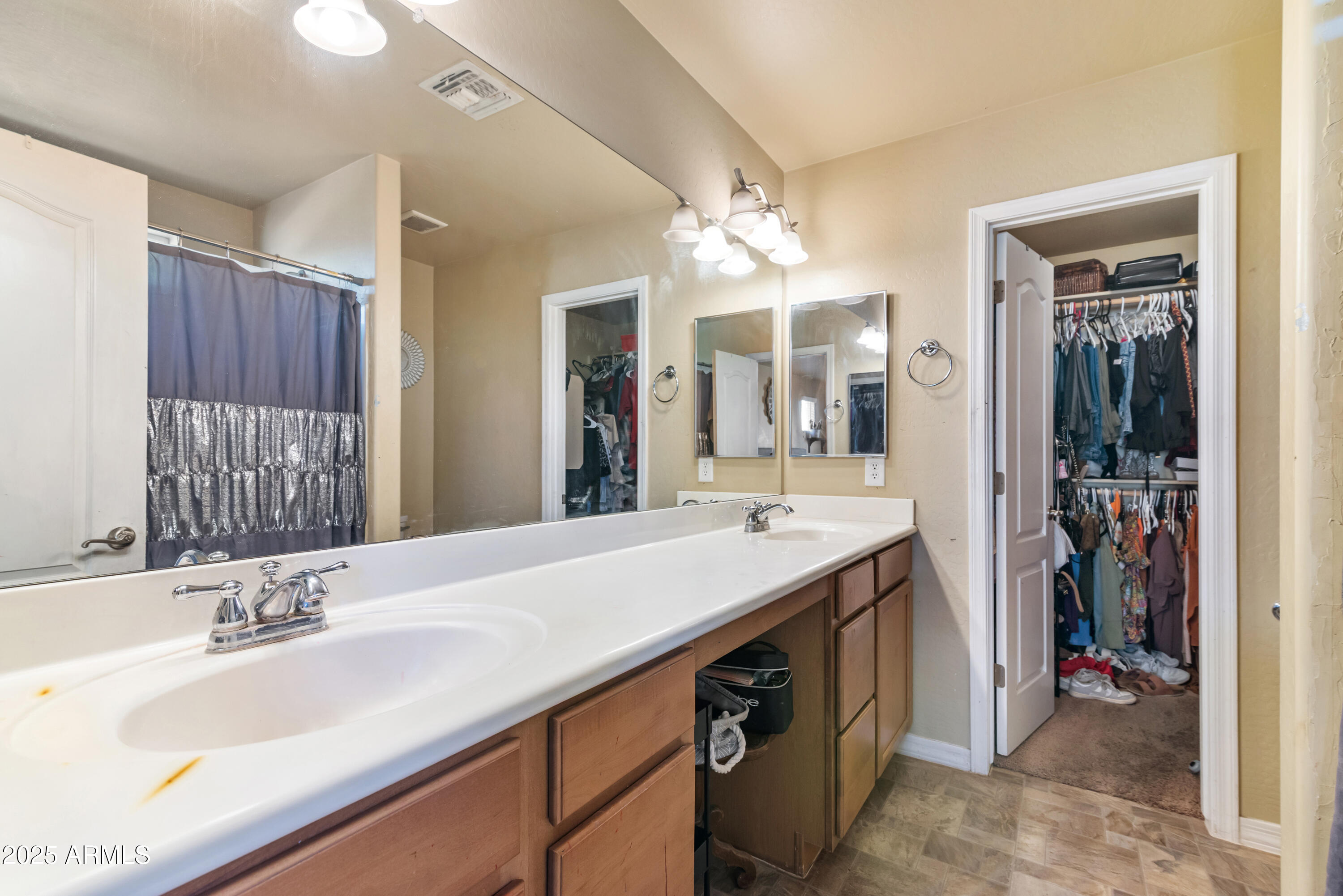 878 South Huish Drive, Unit LOT 105 Gilbert, AZ 85296 - Photo 25 of 51 a spacious bathroom with a double vanity sink and a mirror