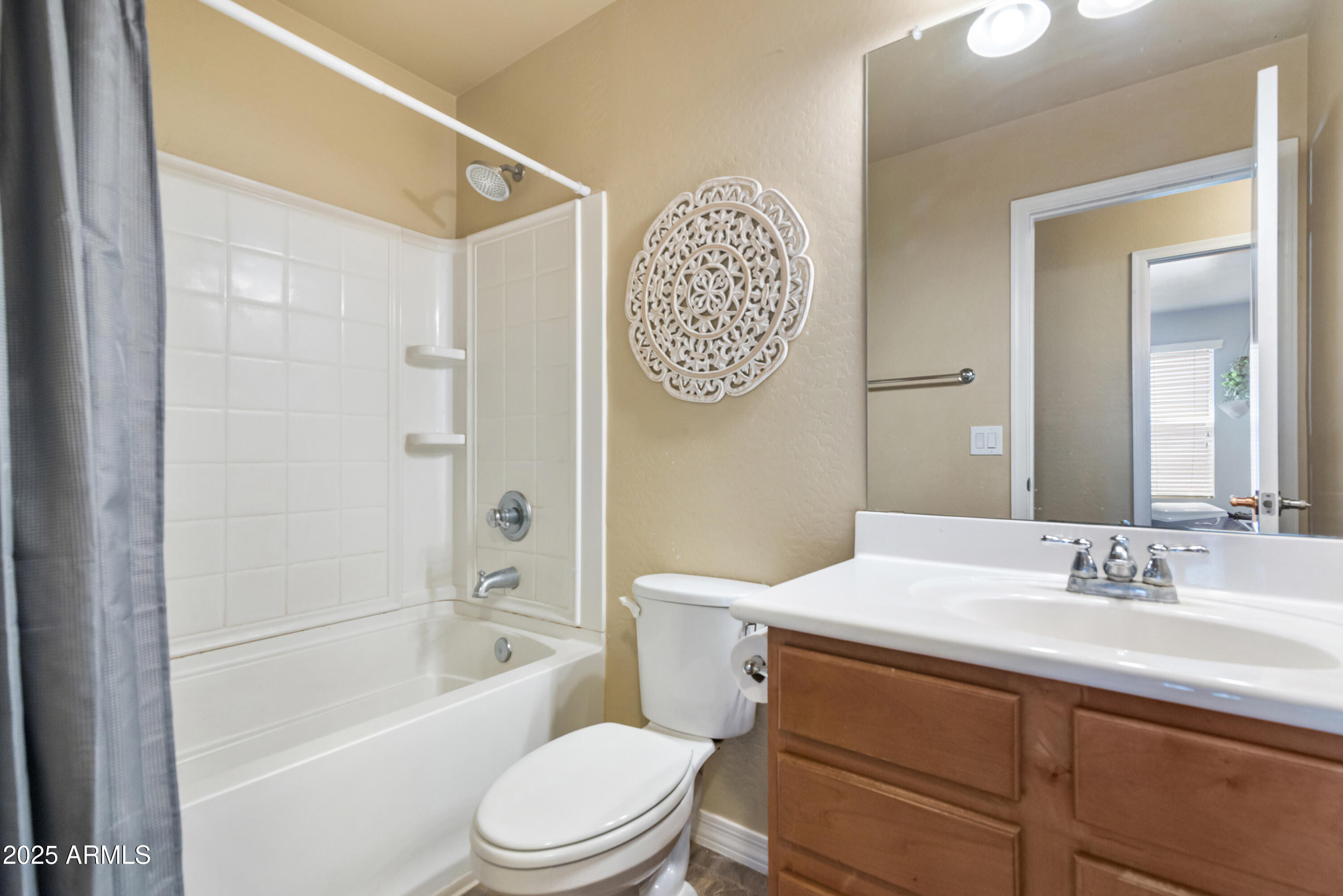 878 South Huish Drive, Unit LOT 105 Gilbert, AZ 85296 - Photo 27 of 51 a bathroom with a sink a toilet and shower