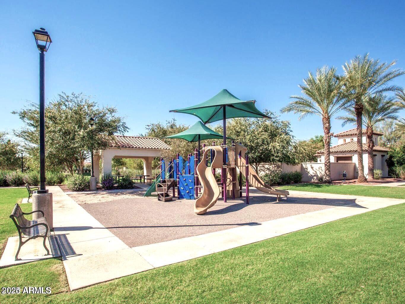 878 South Huish Drive, Unit LOT 105 Gilbert, AZ 85296 - Photo 41 of 51 a view of a house with backyard and a patio