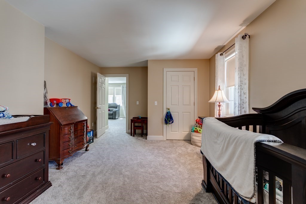 97 Glenwood Road Rutland, MA 01543 - Photo 17 of 26 a living room with furniture and a window