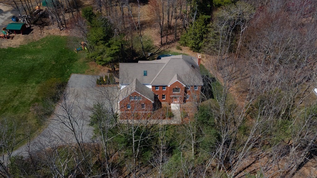 97 Glenwood Road Rutland, MA 01543 - Photo 26 of 26 an aerial view of a house with outdoor space and trees all around