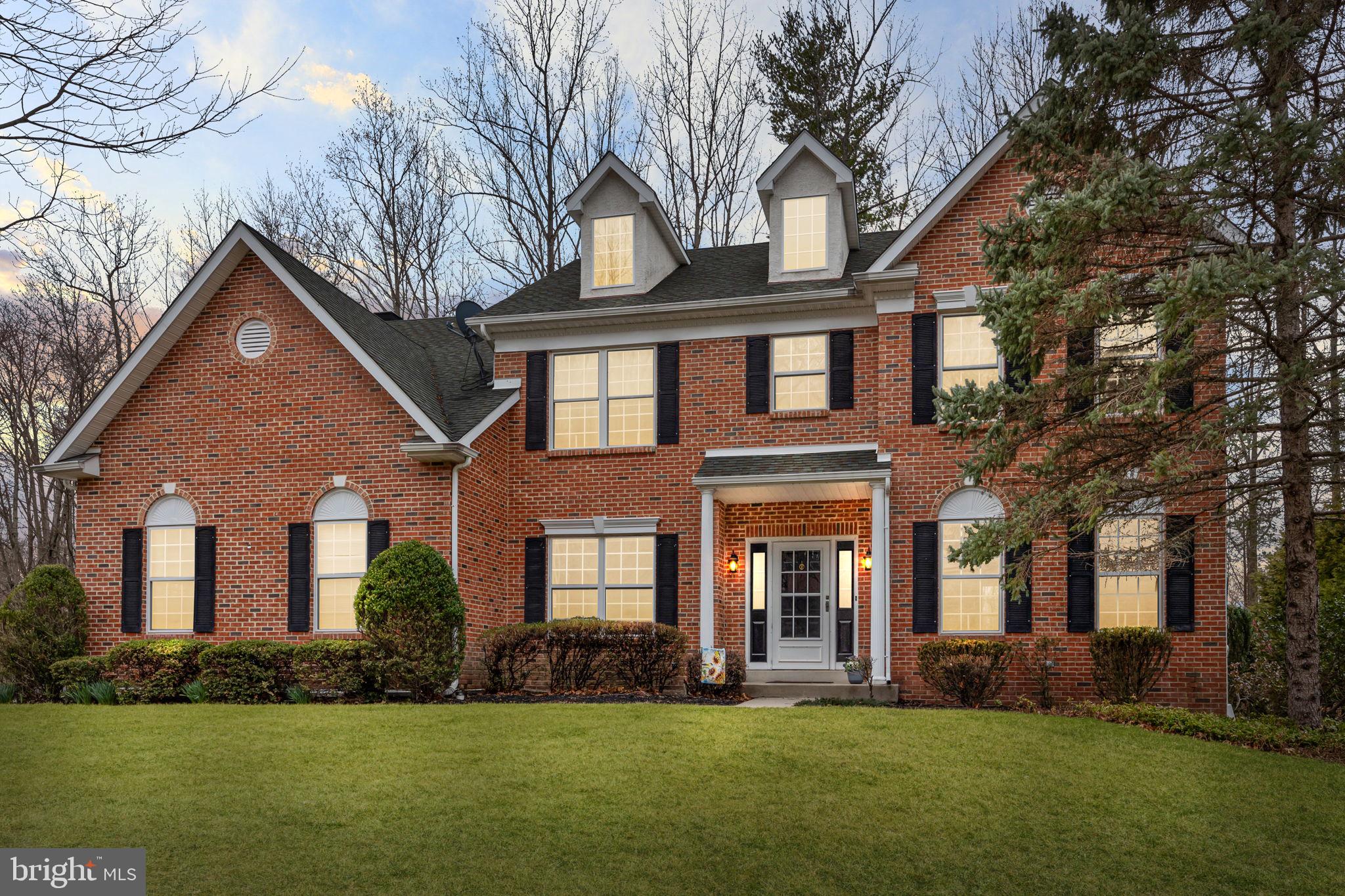 4040 Charter Club Drive Doylestown, PA 18902 - Photo 1 of 50 a front view of a house with a yard