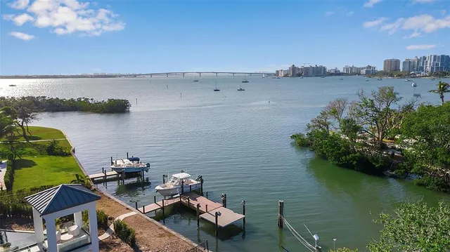 an aerial view of a house with a lake view