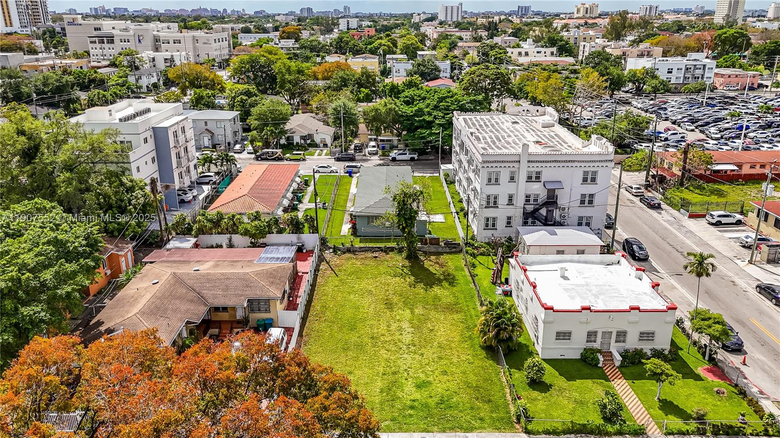 512 Southwest 6th Avenue Miami, FL 33130 - Photo 13 of 15 an aerial view of a house with swimming pool and large trees