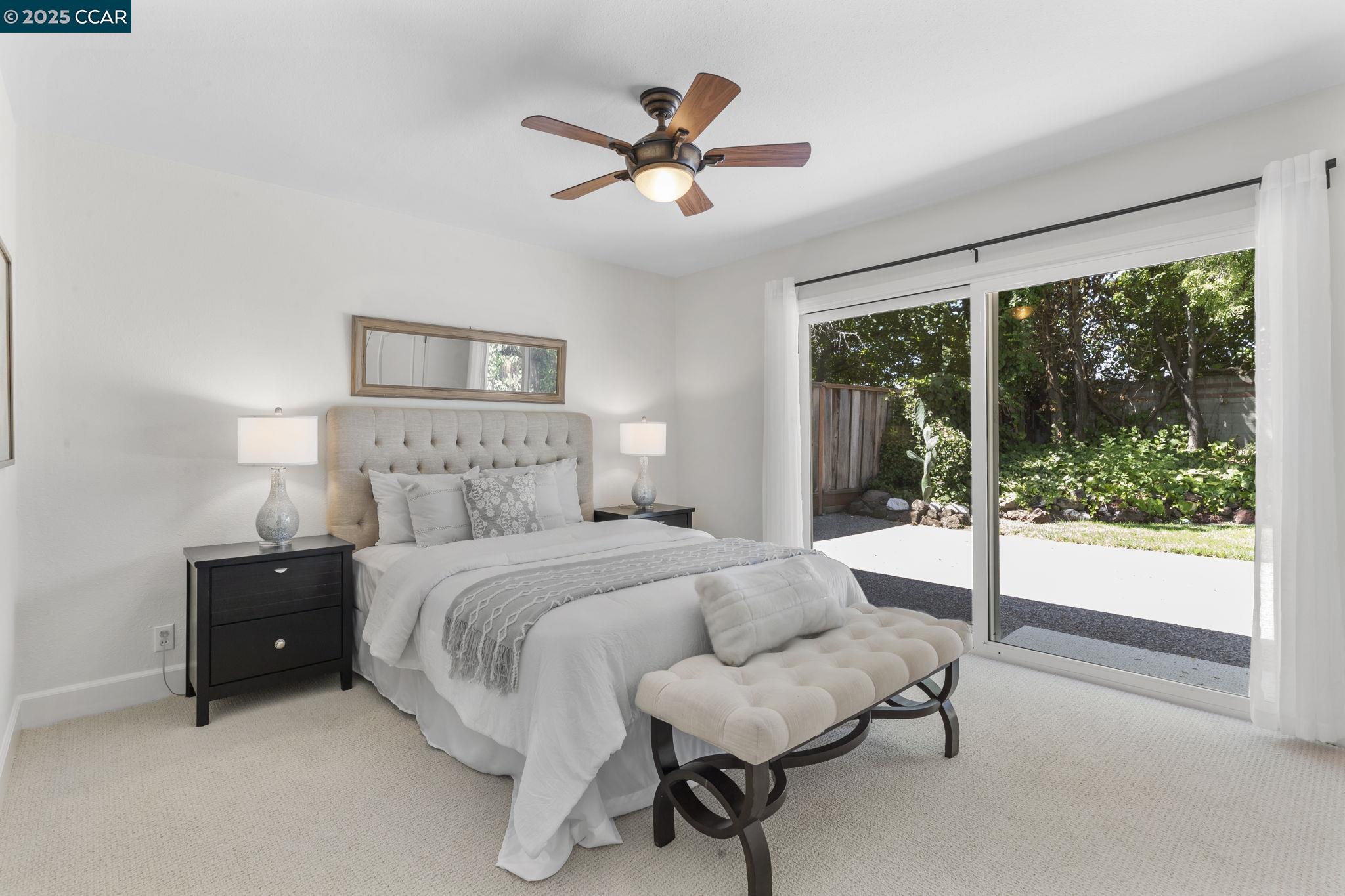 3249 Claudia Drive Concord, CA 94519 - Photo 18 of 34 a spacious bedroom with a bed and a large window