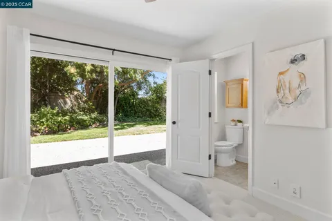 a bathroom with a toilet sink and shower