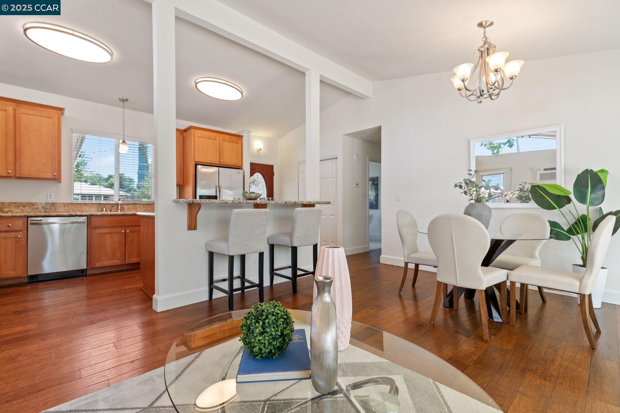 3249 Claudia Drive Concord, CA 94519 - Photo 8 of 34 a view of a dining room with furniture and wooden floor