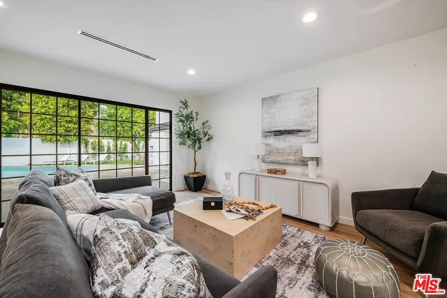 a living room with furniture and a couch