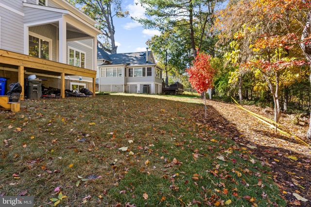 a tall building with trees in front of it