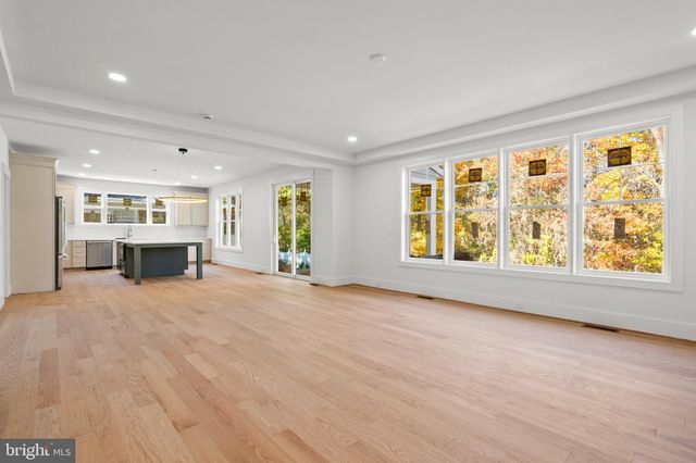 a view of balcony with wooden floor
