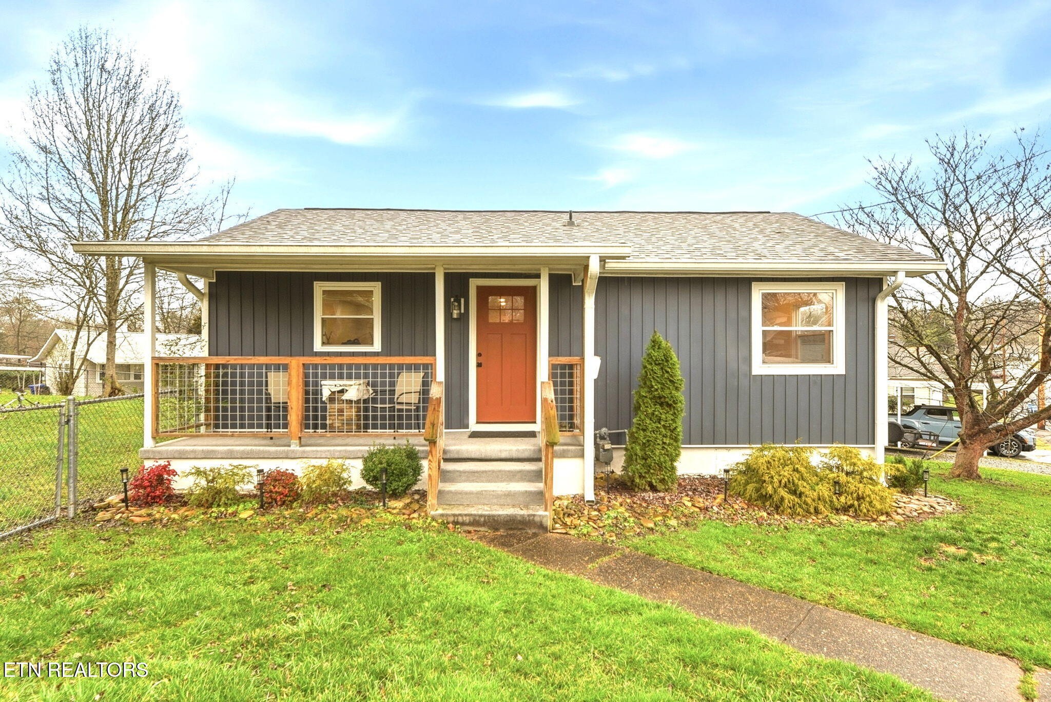 110 Parma Road Oak Ridge, TN 37830 - Photo 1 of 23 front view of a house with a yard