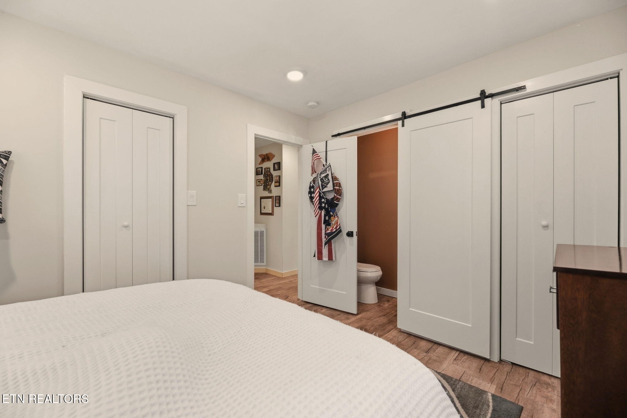 110 Parma Road Oak Ridge, TN 37830 - Photo 12 of 23 a bedroom with a large bed and a shower