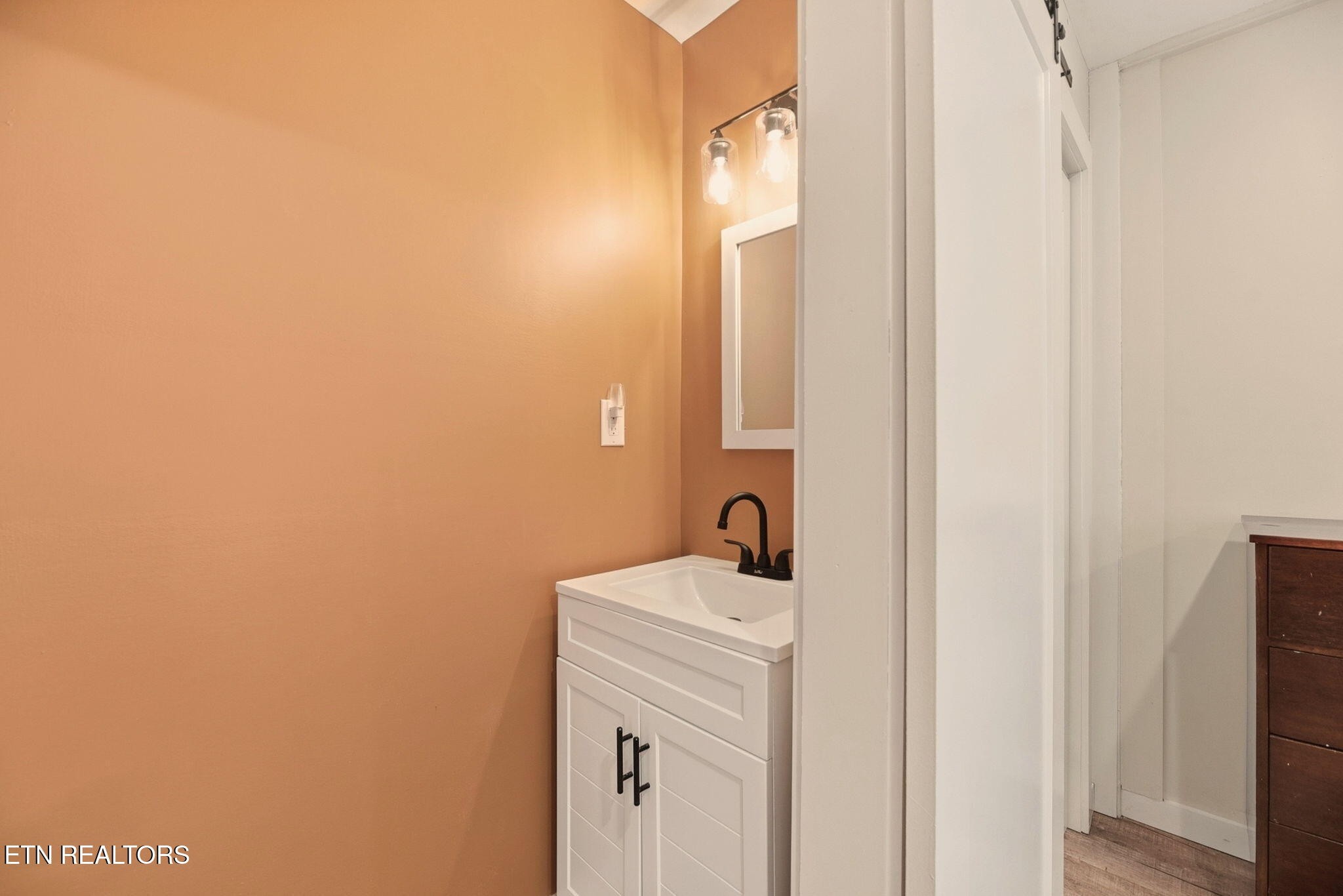 110 Parma Road Oak Ridge, TN 37830 - Photo 13 of 23 a bathroom with a sink and a mirror