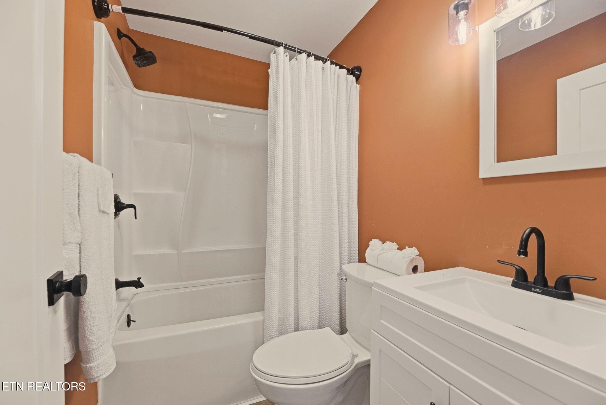 110 Parma Road Oak Ridge, TN 37830 - Photo 16 of 23 a bathroom with a sink a toilet and shower