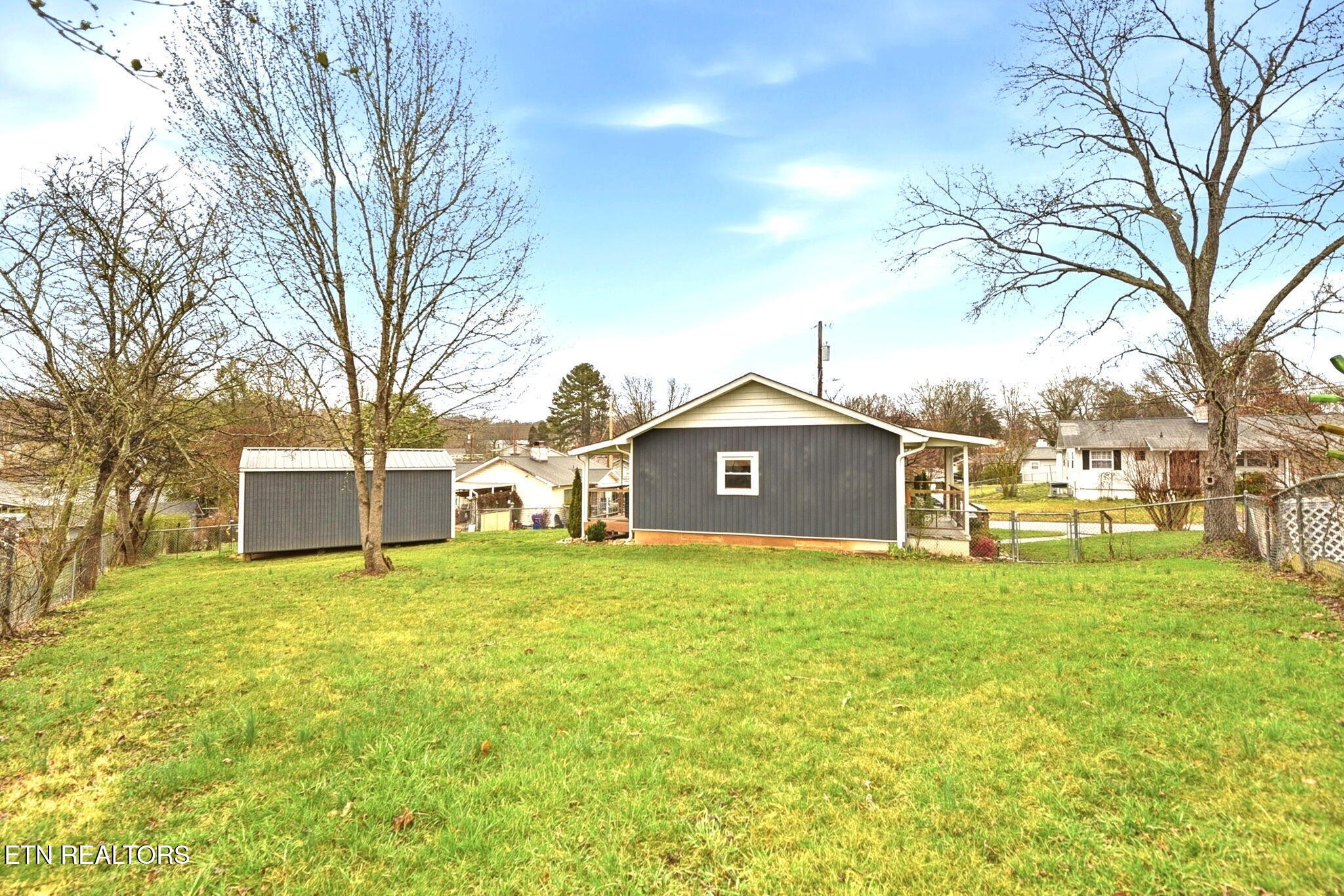 110 Parma Road Oak Ridge, TN 37830 - Photo 20 of 23 a front view of a house with a yard