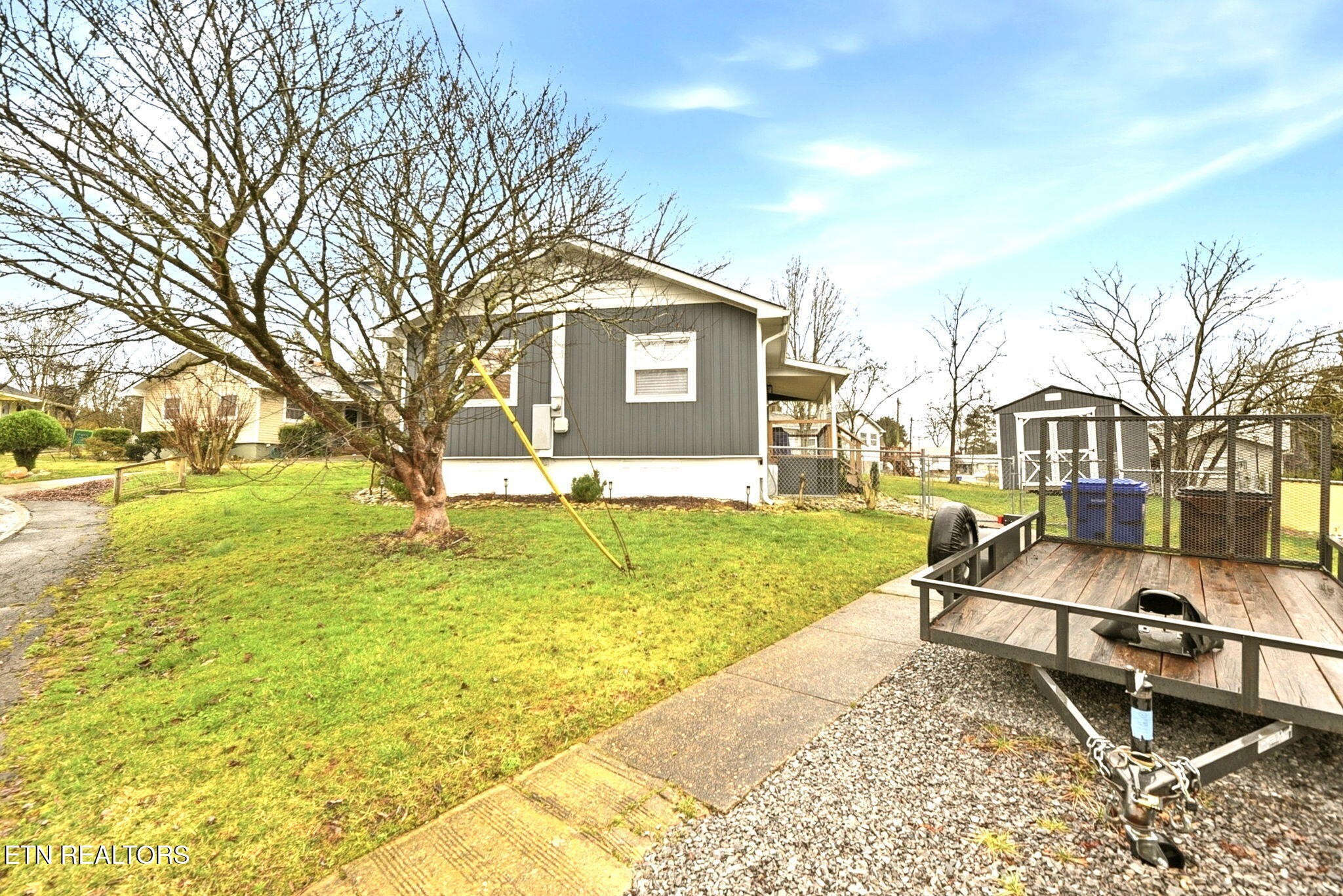 110 Parma Road Oak Ridge, TN 37830 - Photo 23 of 23 a view of a house with a yard