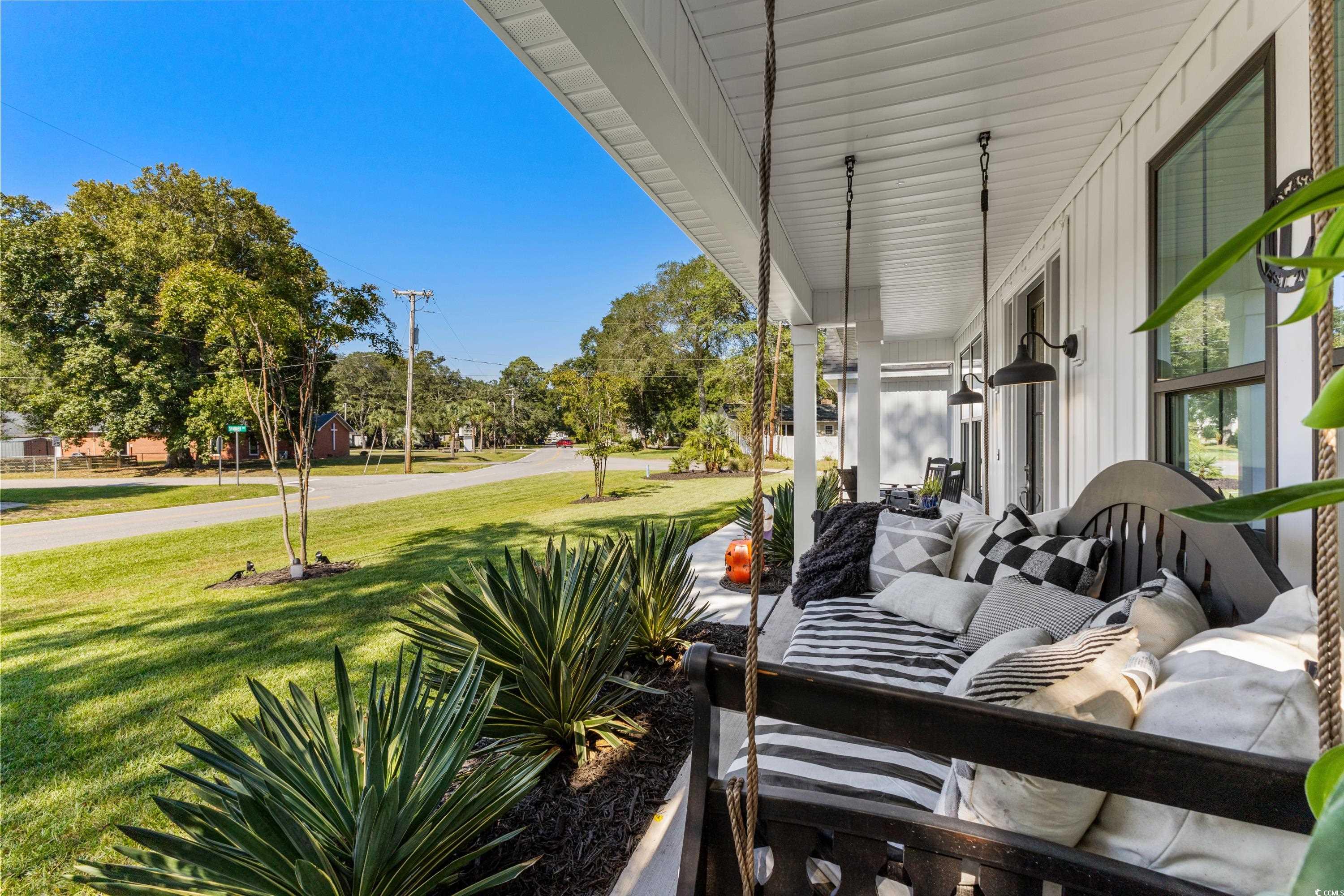 595 Wilcox Avenue Murrells Inlet, SC 29576 - Photo 5 of 40 View of patio with a porch and an outdoor hangout