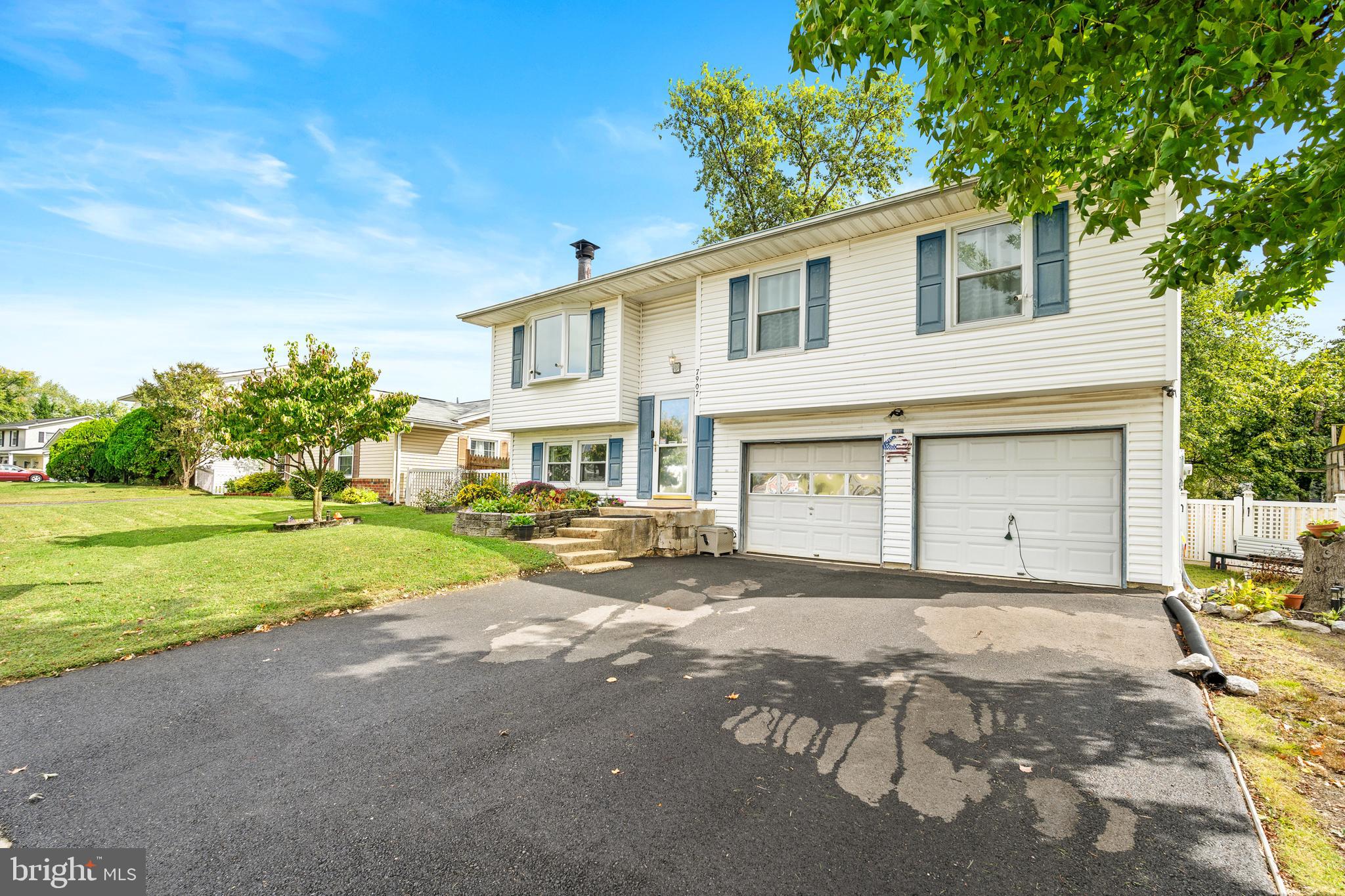 7907 Stone Hearth Road Severn, MD 21144 - Photo 2 of 24 a view of a house with backyard and garden