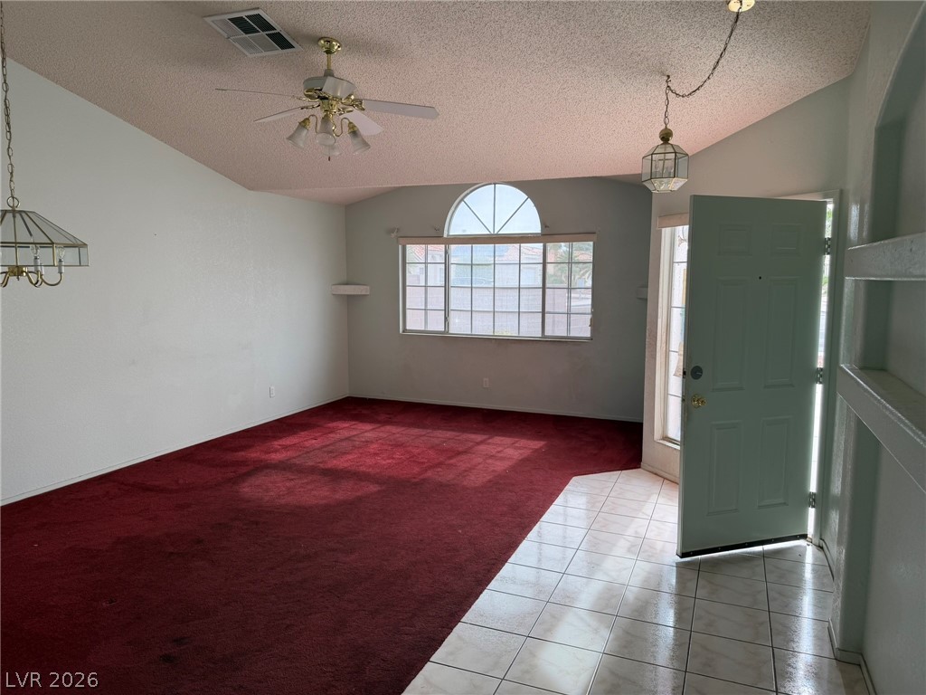 277 Gentle Bay Avenue Henderson, NV 89074 - Photo 24 of 43 This inviting living area boasts high ceilings and abundant natural light.