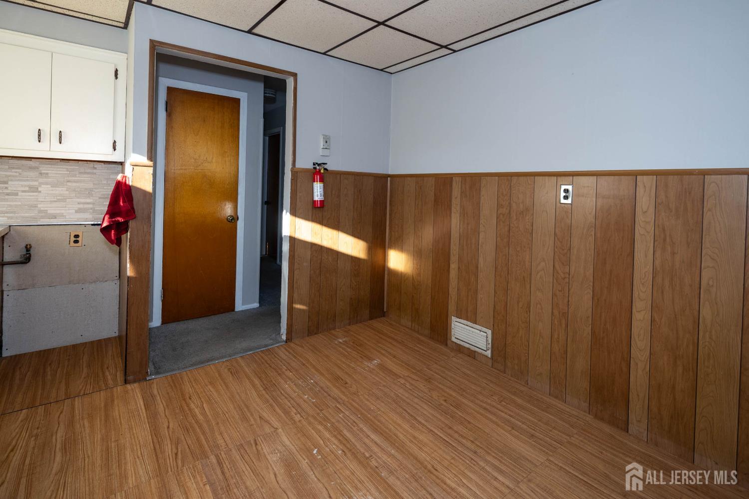 111 Longview Circle Fords, NJ 08863 - Photo 12 of 21 a view of hallway with wooden floor