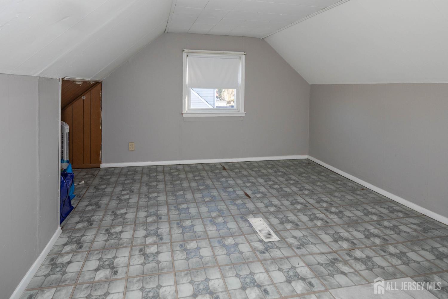111 Longview Circle Fords, NJ 08863 - Photo 17 of 21 an empty room with windows