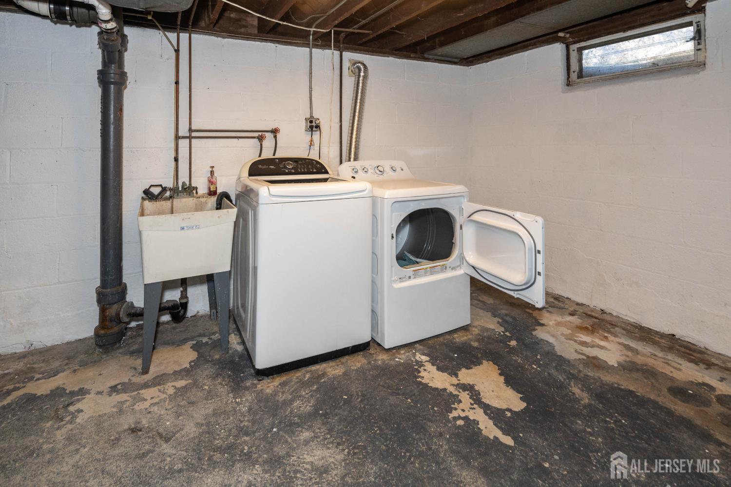 111 Longview Circle Fords, NJ 08863 - Photo 18 of 21 a utility room with dryer and washer