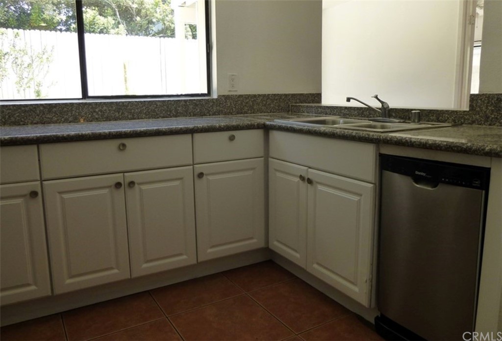 53 Carver Irvine, CA 92620 - Photo 4 of 12 a kitchen with a sink and large window