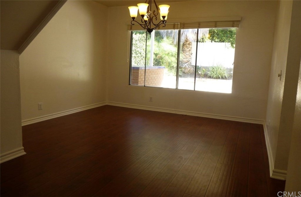 53 Carver Irvine, CA 92620 - Photo 6 of 12 a view of a livingroom with wooden floor and a large window