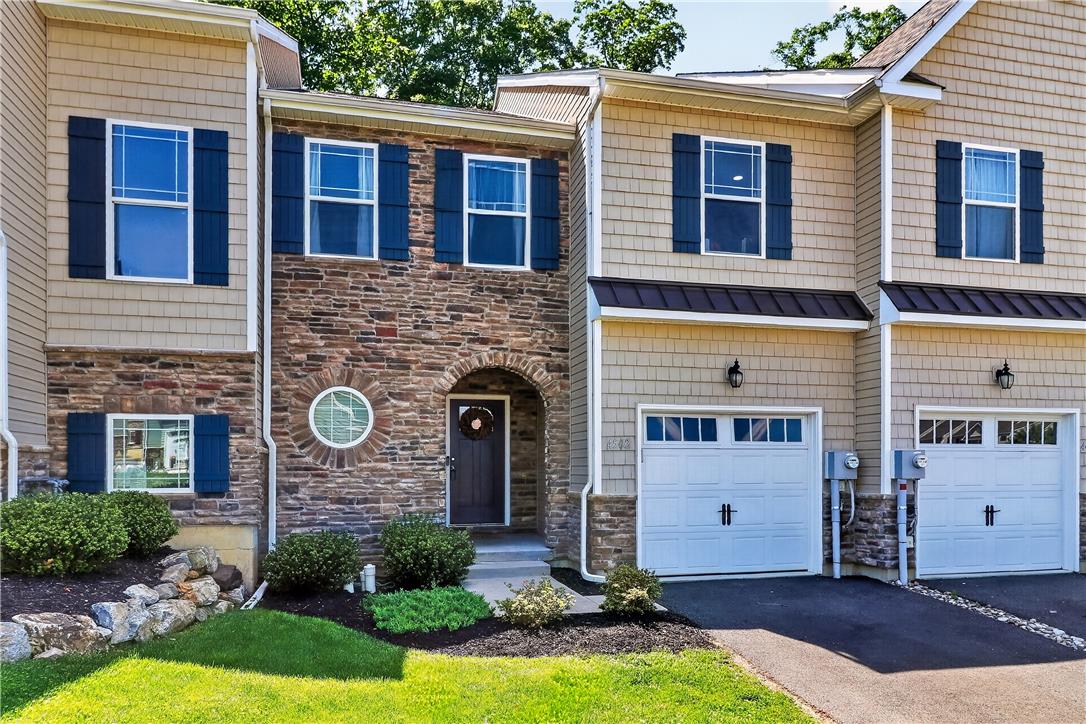 4502 Benjamin Court Emmaus, PA 18049 - Photo 1 of 48 Stone and siding exterior offers a charming first impression for these townhomes.