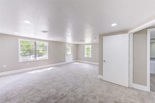 a view of an empty room with window