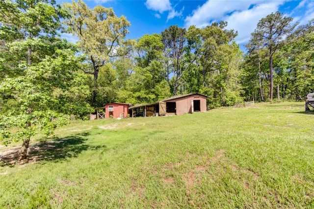 a house view with a outdoor space