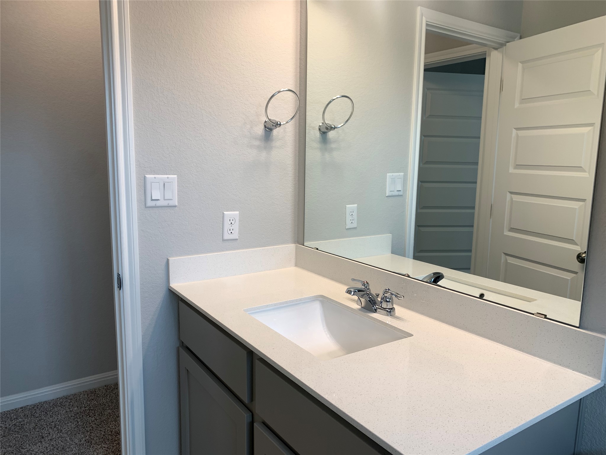 2948 Sage Ranch Drive Leander, TX 78641 - Photo 22 of 28 A well-appointed bathroom vanity with a spacious counter and contemporary fixtures.